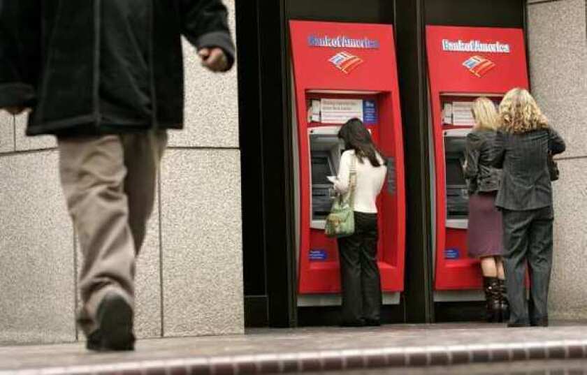 Customers use Bank of America ATMs in Los Angeles.