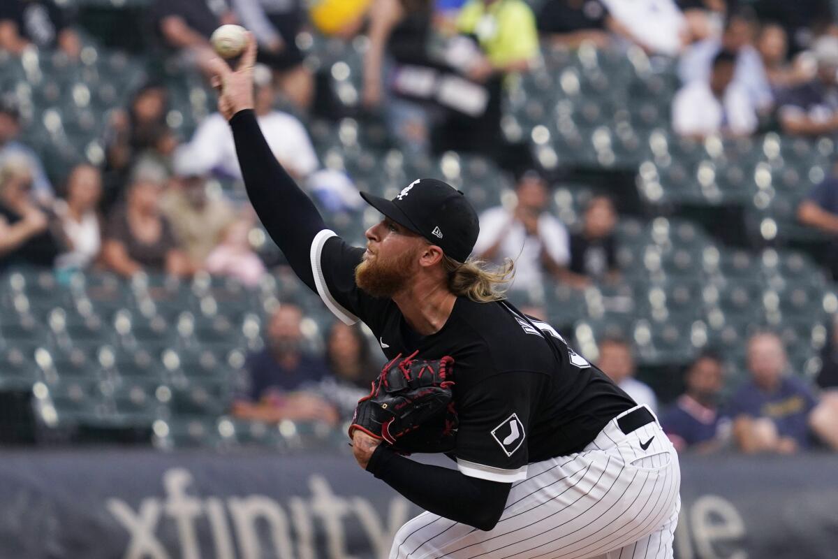 Chicago White Sox starting pitcher Michael Kopech throws against the Detroit Tigers during the first inning of a baseball game in Chicago, Friday, Aug. 12, 2022. (AP Photo/Nam Y. Huh)