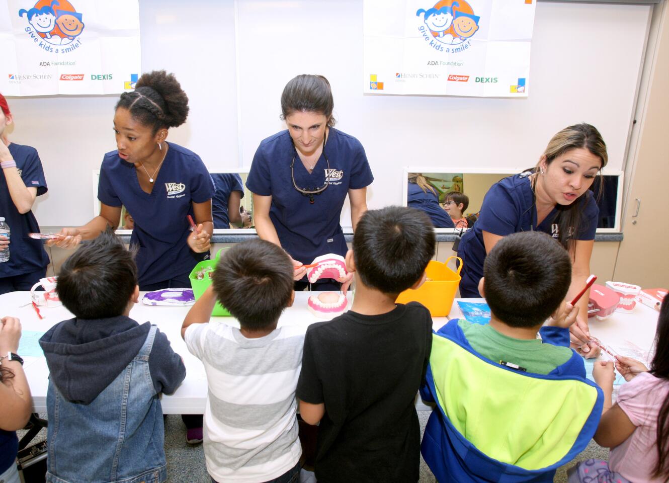 Photo Gallery: Providencia Elementary School students get free dental checkups