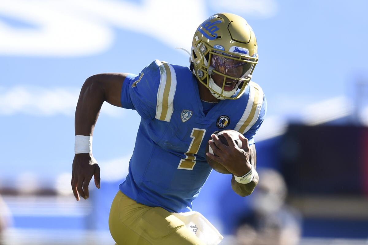 UCLA quarterback Dorian Thompson-Robinson runs the ball during a win over California on Nov. 15.