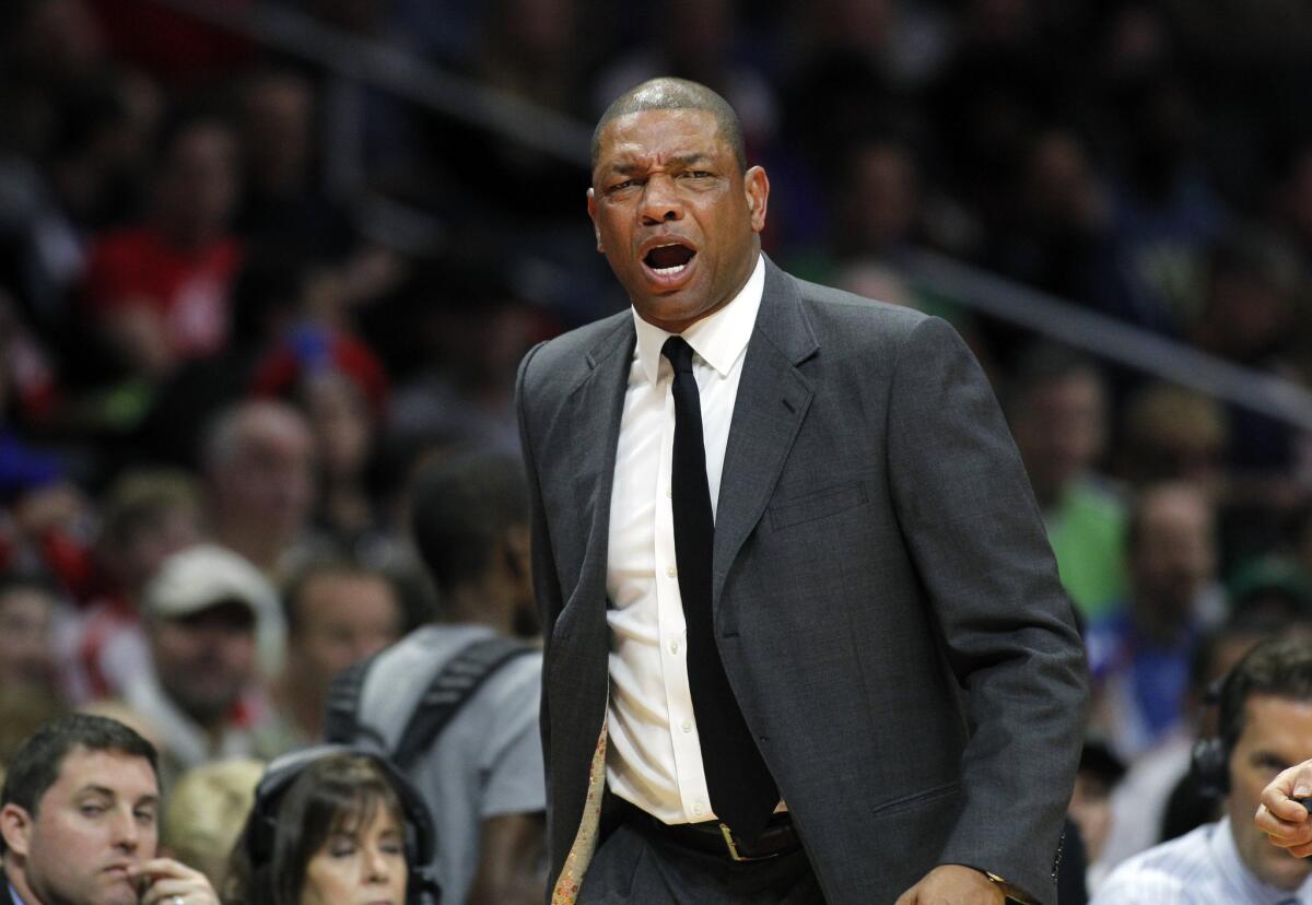 Clippers Coach Doc Rivers reacts to a referee's call during the first half of a game Jan. 19 against the Boston Celtics at Staples Center. The Clippers beat the Celtics, 102-93.