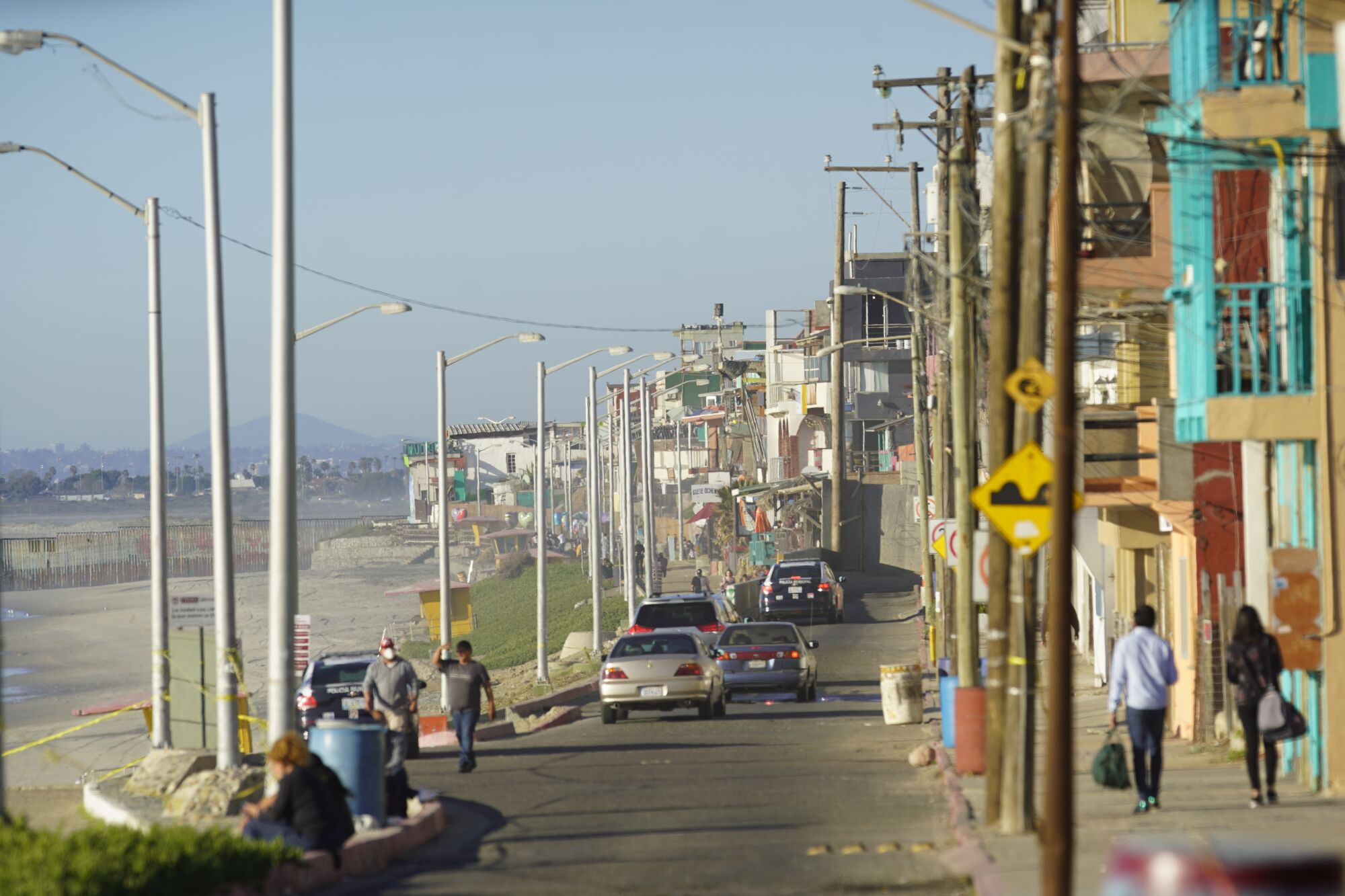  In the distance, the border fence and downtown San Diego can be seen from Playas de Tijuana.
