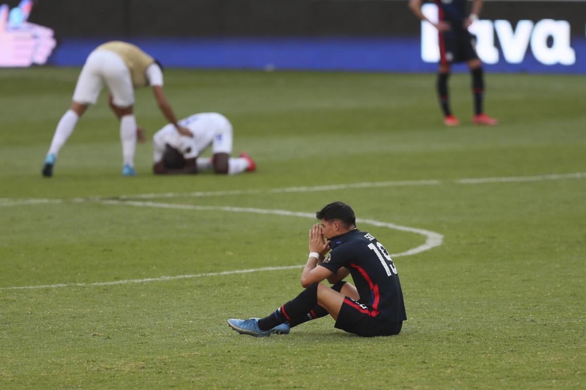 U.S. player Sebastian Soto reacts after the U.S. failed to qualify for the Olympics following a 2-1 loss to Honduras.