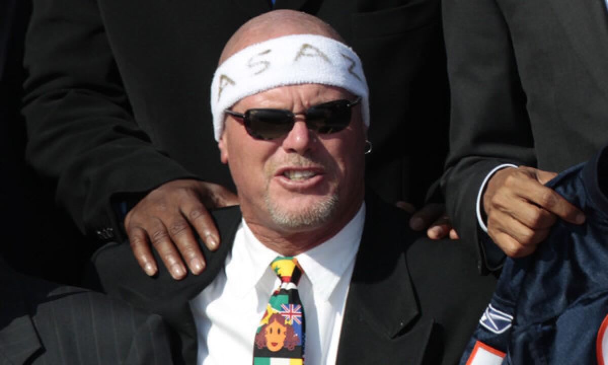Former Chicago Bears quarterback Jim McMahon was among the plaintiffs who reached a concussion lawsuit settlement with the NFL.