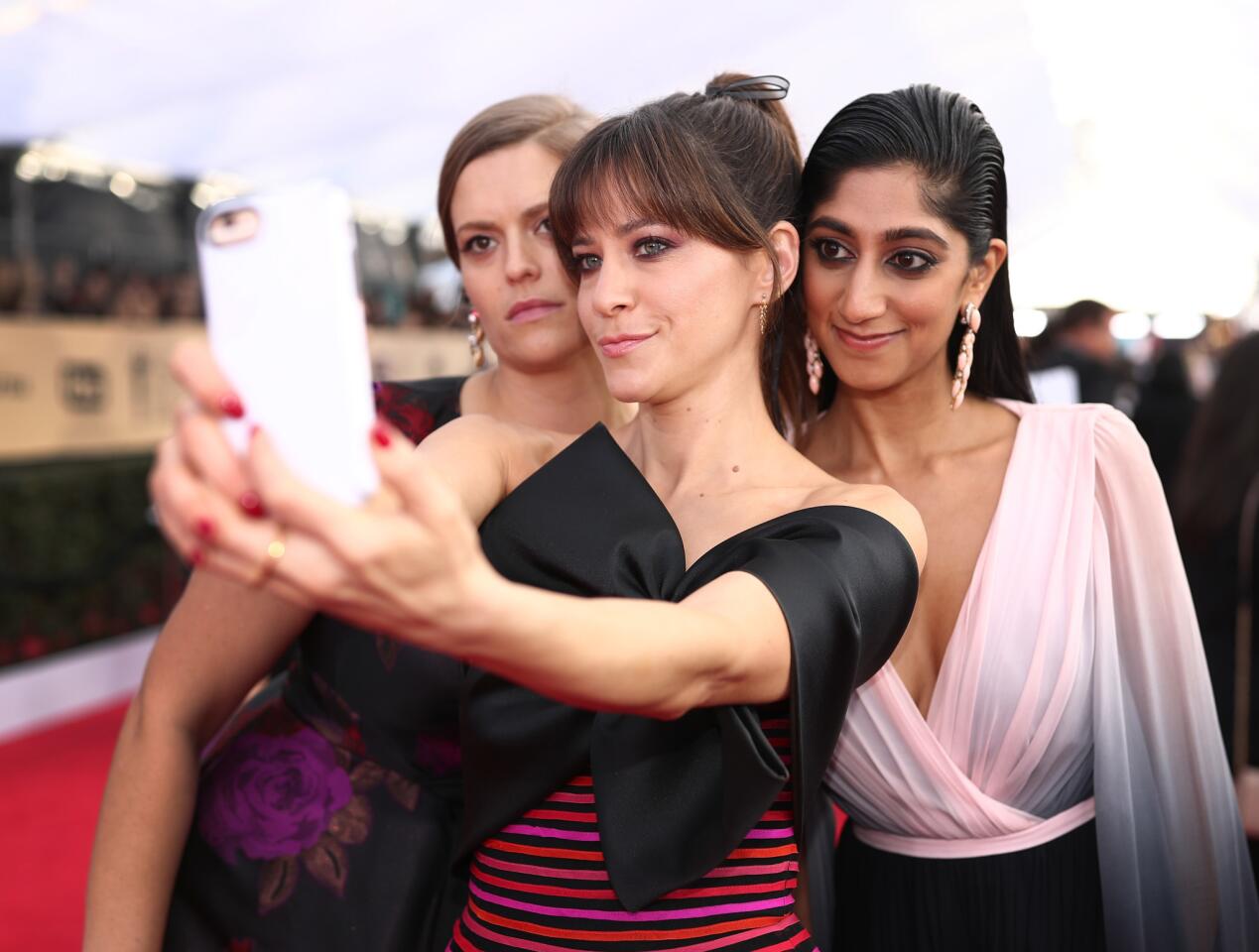 Marianna Palka, Jackie Tohn, AND Sunita Mani take a selfie at the 24th Annual Screen Actors Guild Awards at The Shrine Auditorium on January 21, 2018 in Los Angeles, California.