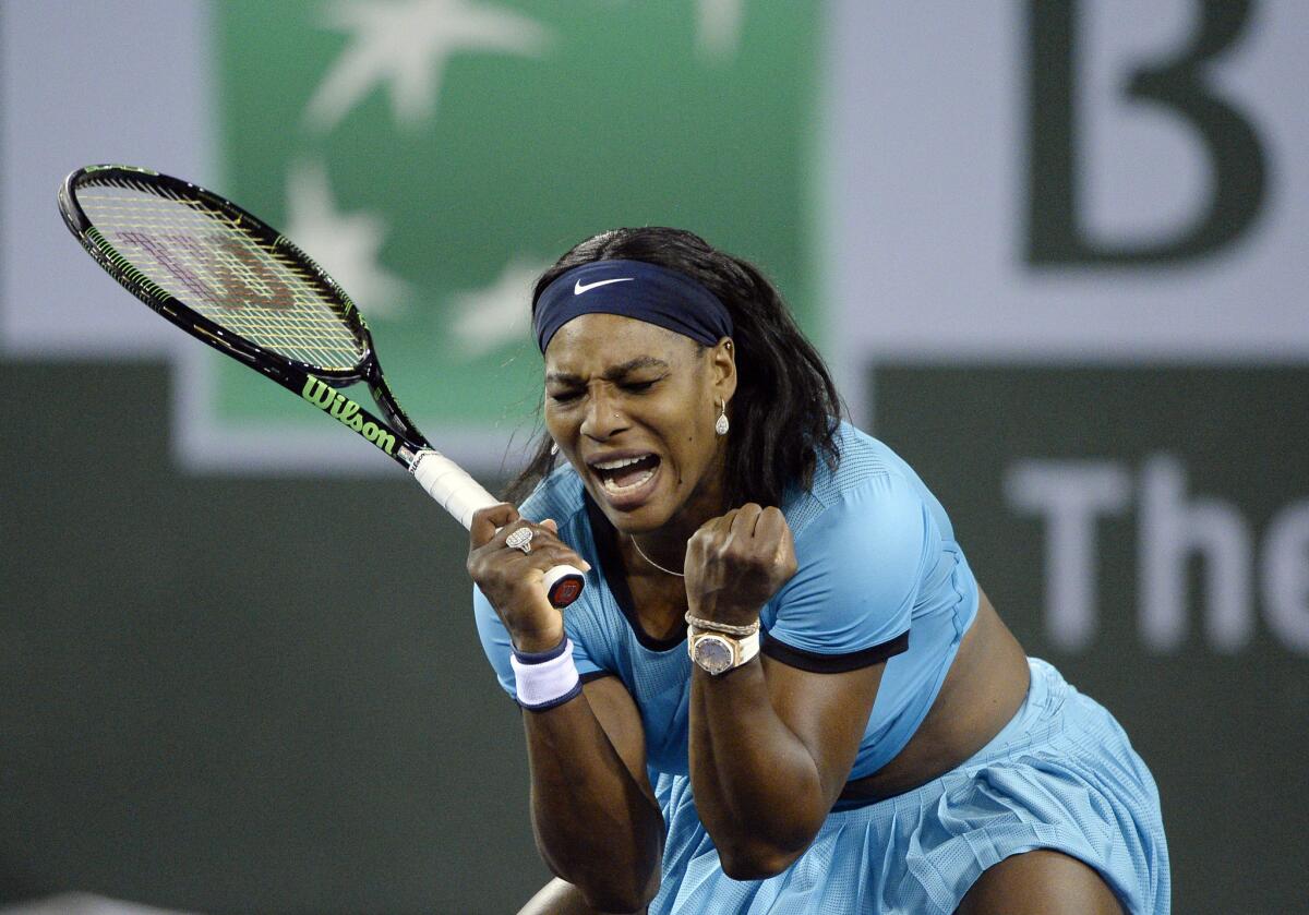Serena Williams of the United States reacts after breaking Agnieszka Radwanska of Poland's serve during a second set tie-breaker at the BNP Paribas Open on March 18.