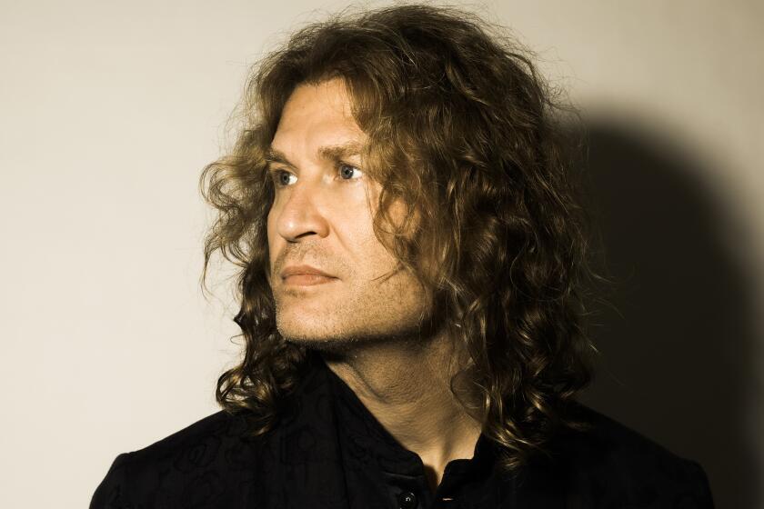 Dave Keuning is the guitarist in the band The Killers