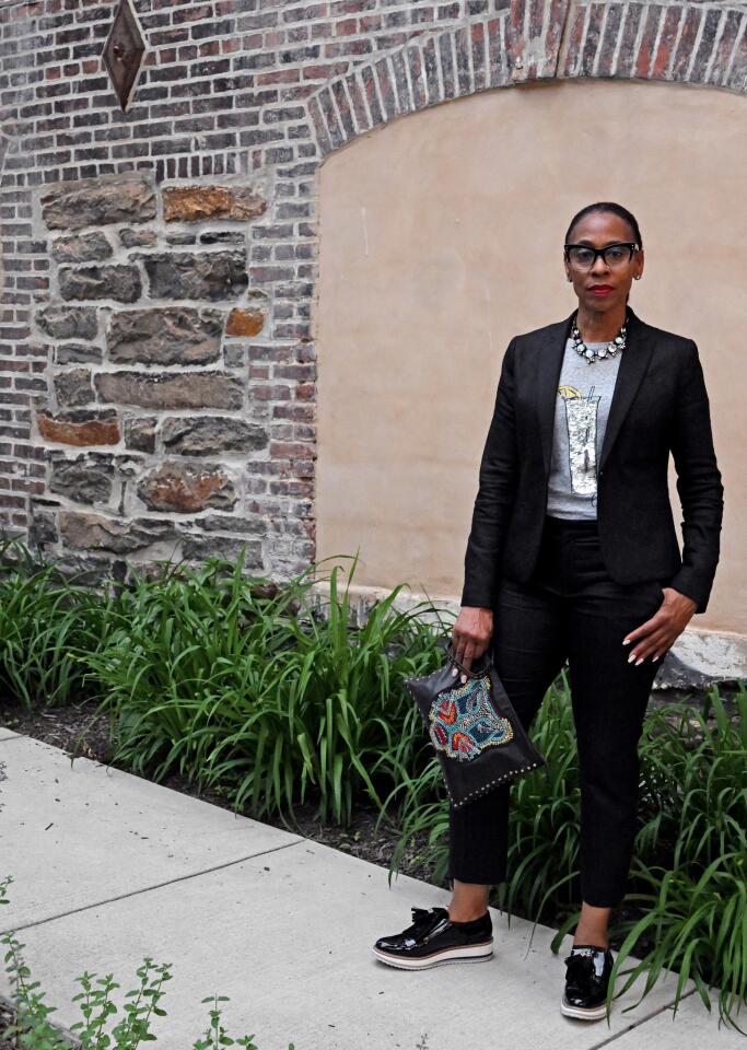 Who: Toni Jones, 58, Northwest Baltimore resident, Northrop Grumman manager of creative services/graphic designer Spotted at: The Night Brunch, held at Cosima What she wore: J. Crew gray graphic T-shirt with sequin embellishment and crystal necklace; Banana Republic black metallic pants suit; and Zara black patent leather platform tassel loafers and clutch with beaded tiger embellishment. Her “corporate glam” style: “I’m a sequins queen. I love anything that’s sparkly or shiny.”
