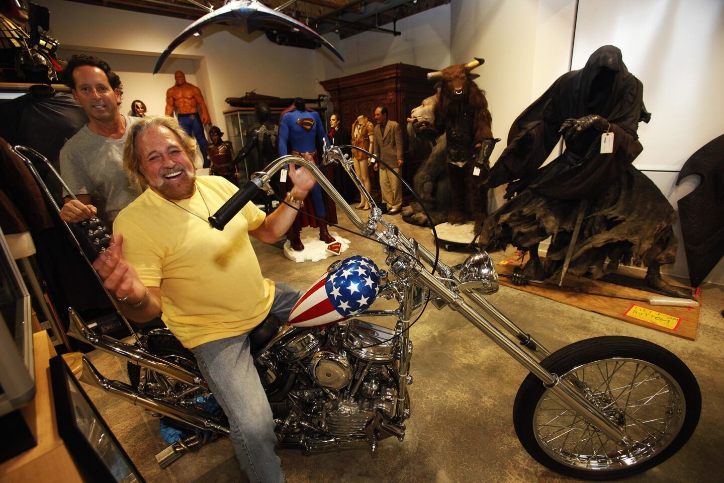 Michael Eisenberg, left, insists his "Captain America" motorcycle is the one from the iconic counterculture film "Easy Rider." Why? Because actor Dan Haggerty, right, says it is.