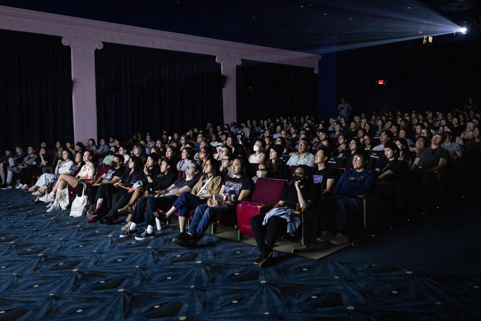 Patrons watch a movie at Vidiots movie theater in Los Angeles.