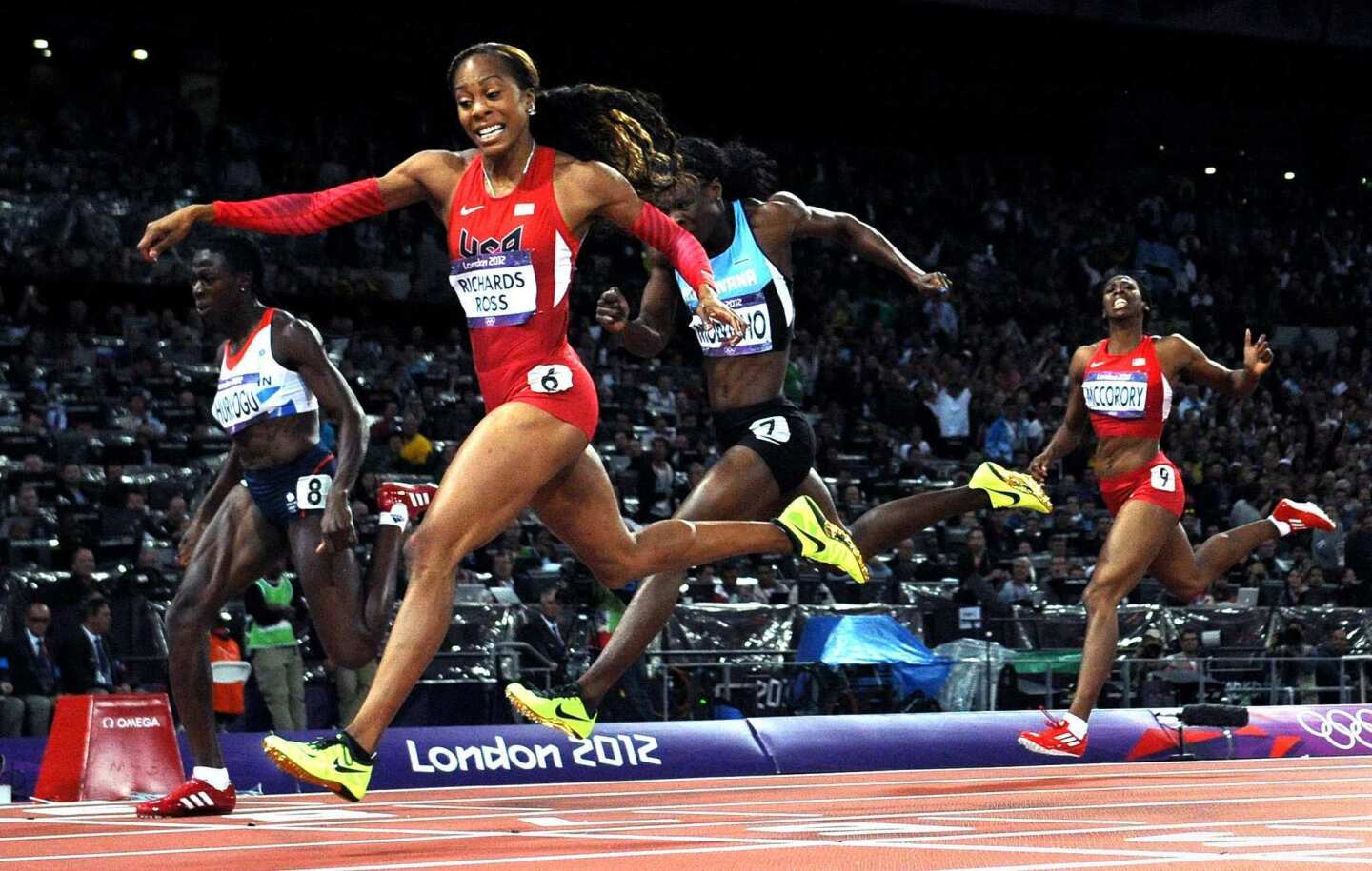 Team USA's Sanya Richards-Ross crosses the finish line to win the gold in the 400 meters at the 2012 London Olympics