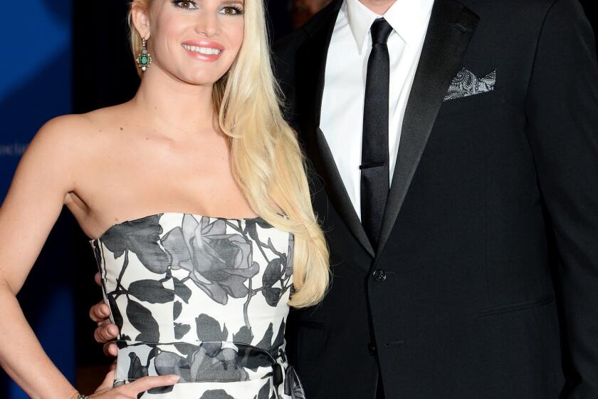 Jessica Simpson and Eric Johnson, shown in May at the White House Correspondents' Dinner.