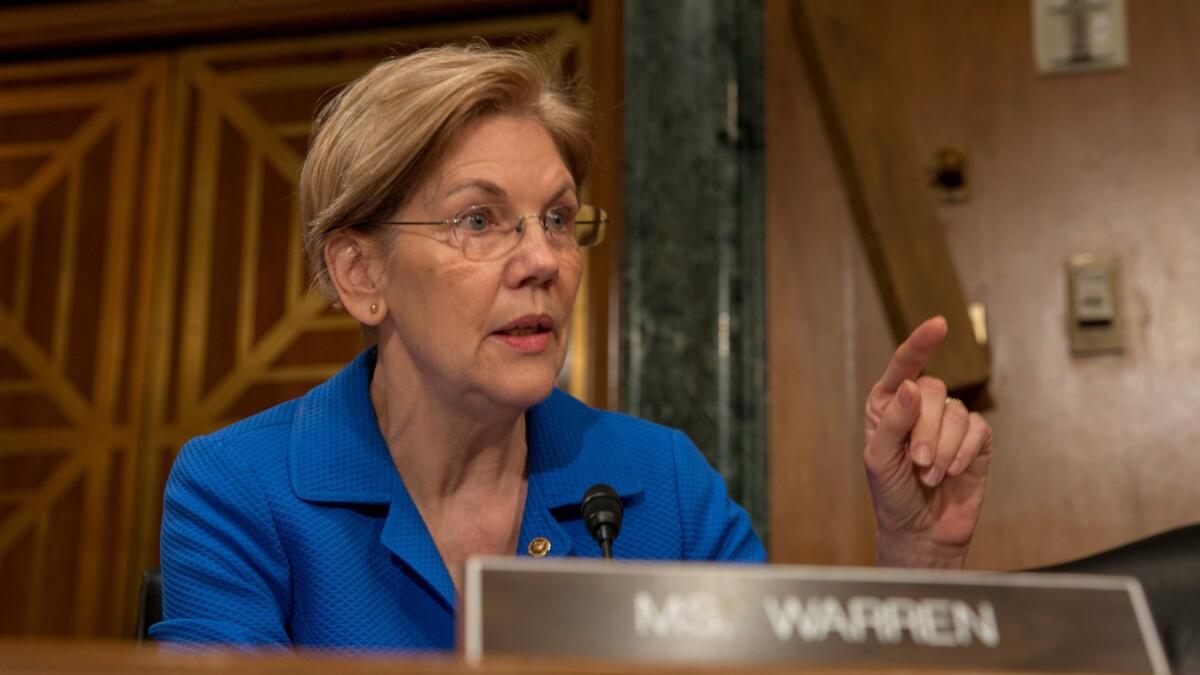 Sen. Elizabeth Warren (D-Mass.), questions Federal Reserve Chairman Jerome H. Powell about Wells Fargo & Co. during a Senate Banking Committee hearing on March 1.
