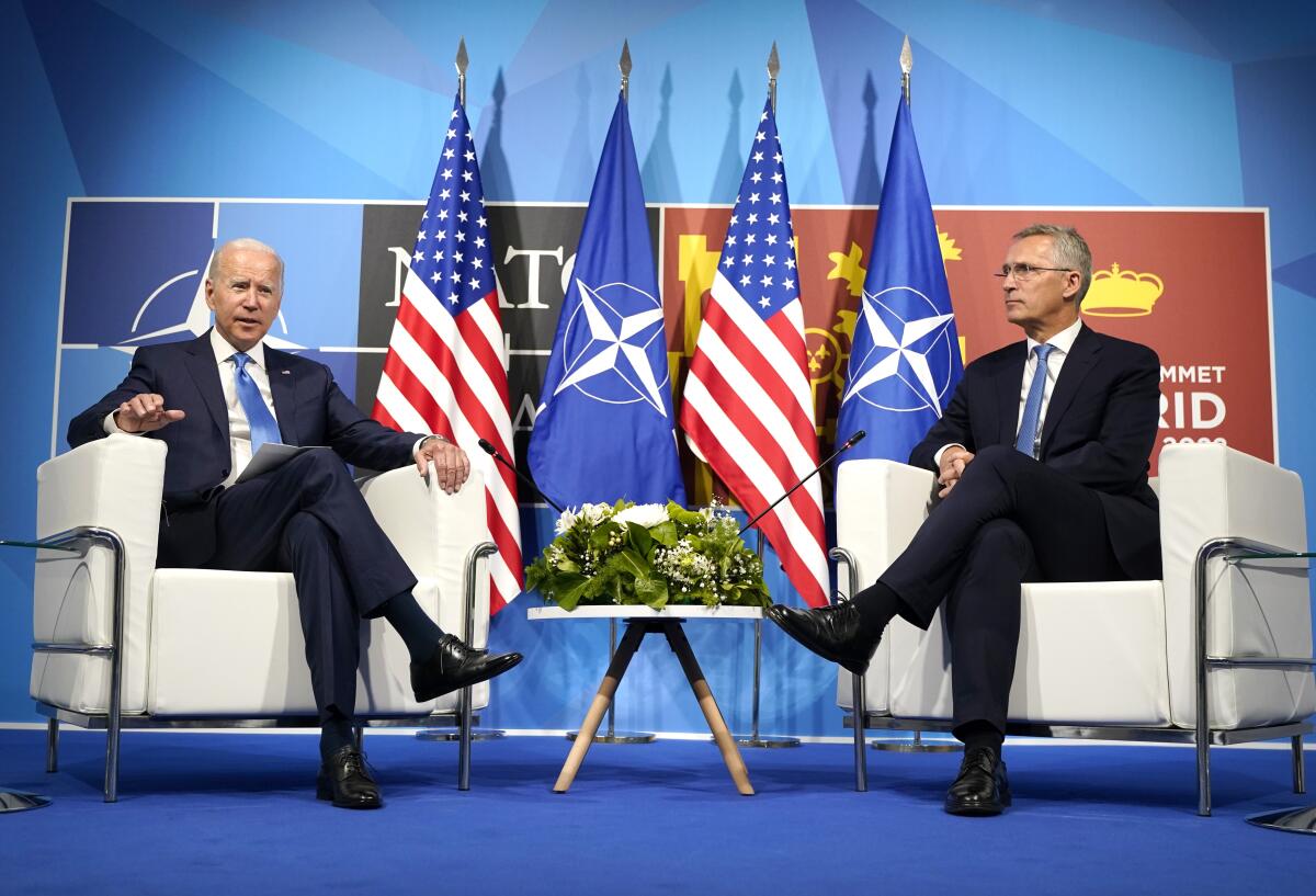 President Biden seated beside NATO Secretary General Jens Stoltenberg