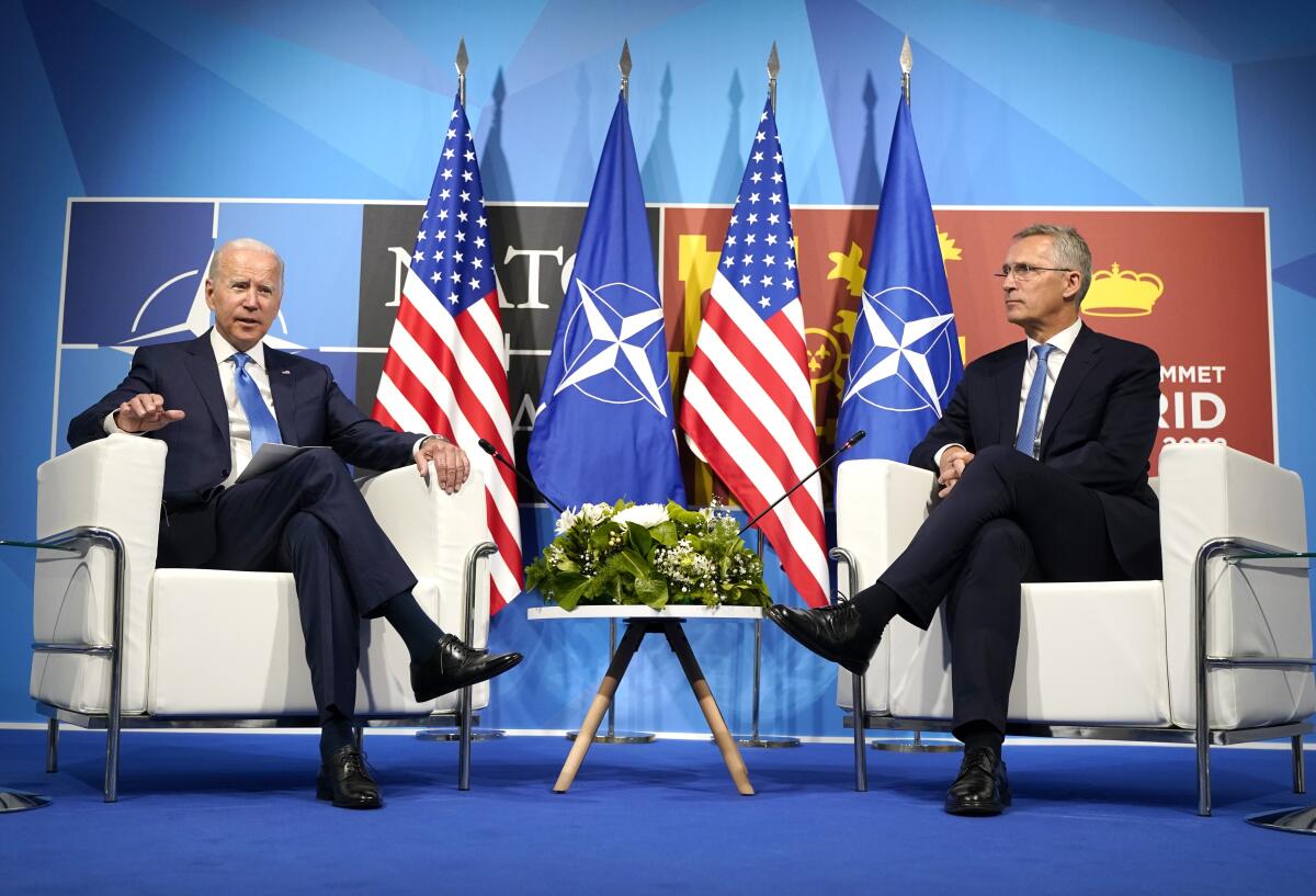 President Biden seated beside NATO Secretary General Jens Stoltenberg