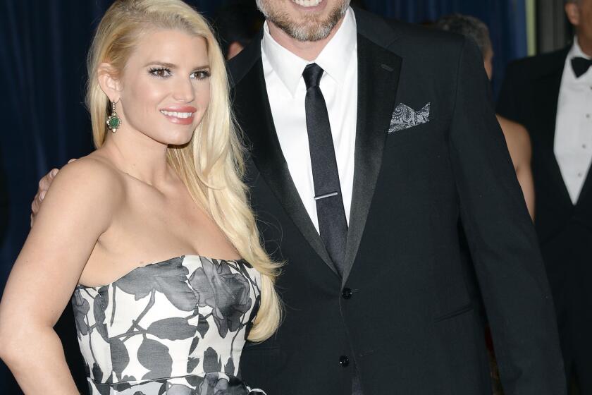 Jessica Simpson and Eric Johnson tied the knot Saturday. Above, the couple attend the White House Correspondents' Assn. Dinner in Washington in May.