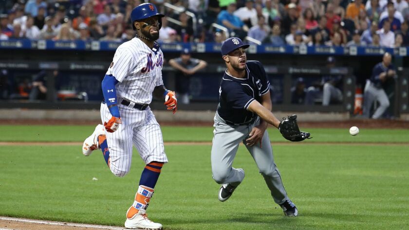 The Mets' Jose Reyes cannot beat out a ground ball as Joey Lucchesi makes the play in the fourth inning on Monday.