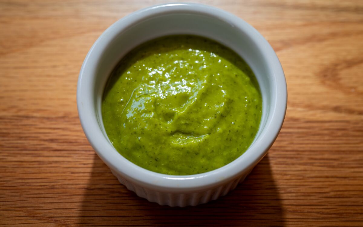 Avocado adds creaminess to this spicy sauce made of jalapeños, cilantro and lime juice. 