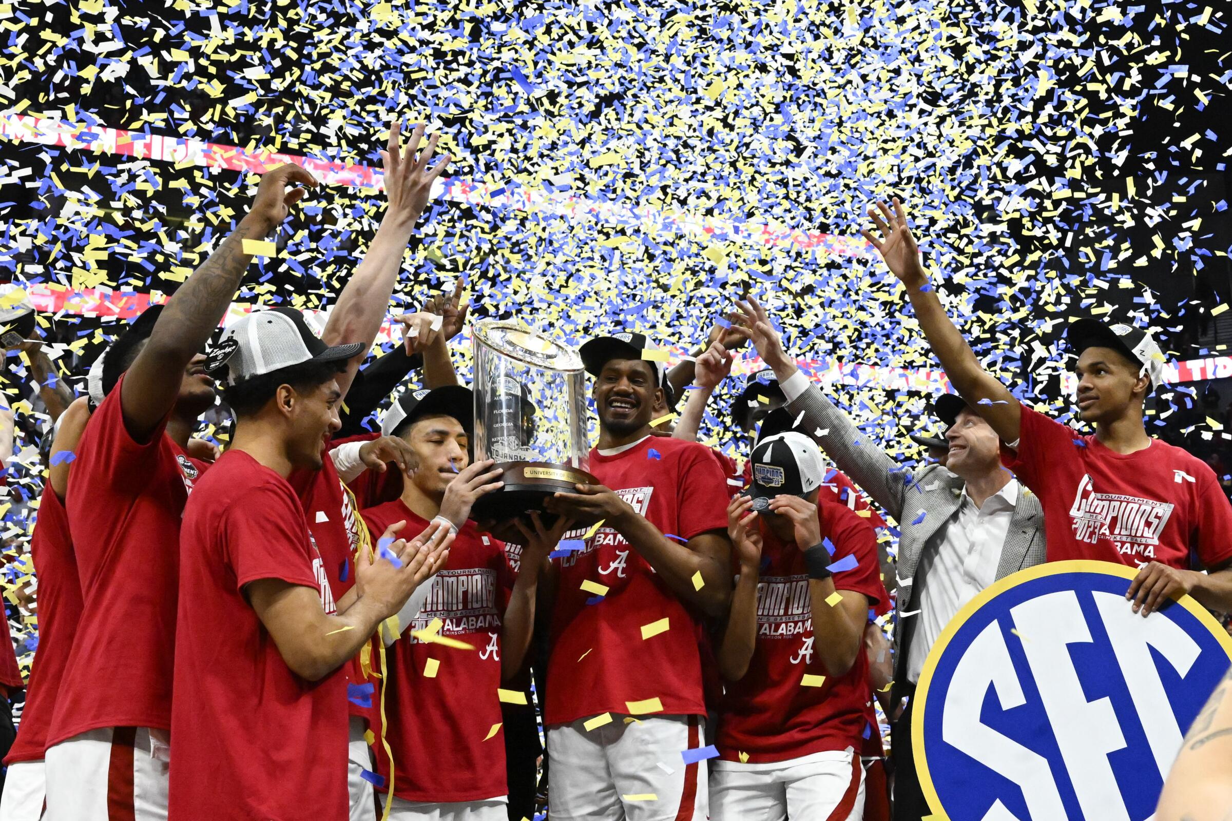 Alabama players celebrate after winning the Southeastern Conference title on March 12.