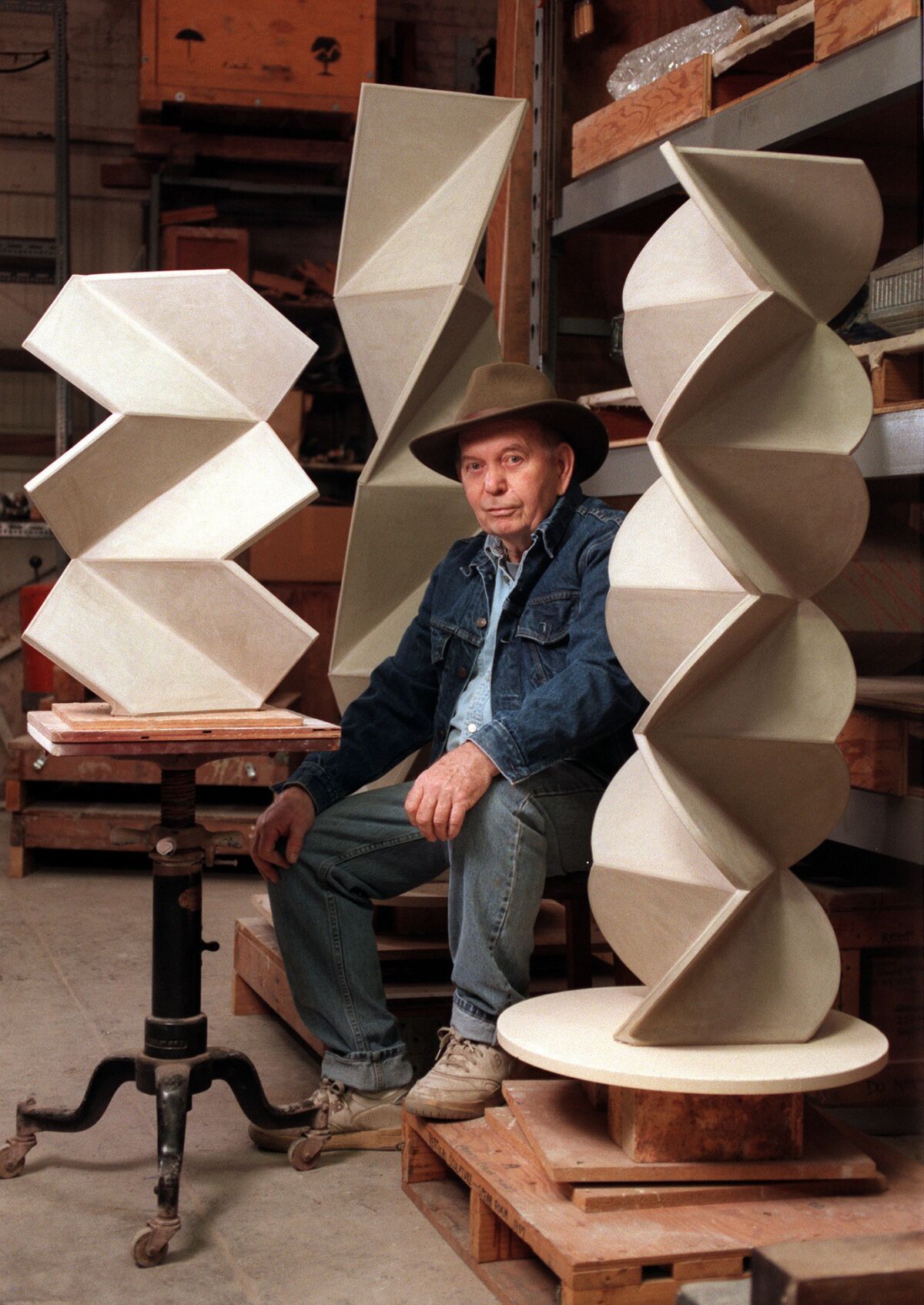 Mason, photographed at age 69 in his studio surrounded by his work.