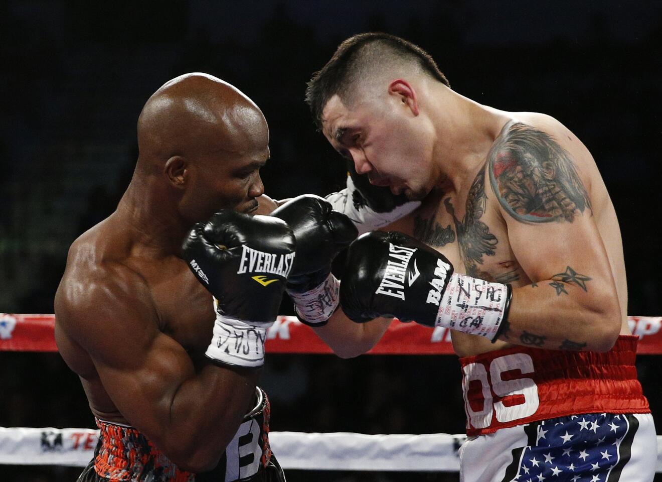 Timothy Bradley works inside against Brandon Rios during their WBO welterweight title bout Saturday.