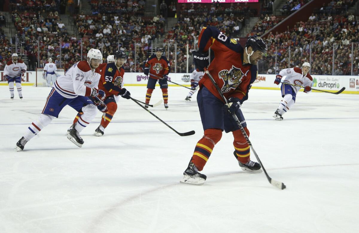 Panthers defenseman Willie Mitchell skates with the puck during the first period of a game against the Canadiens on Dec. 29, 2015.