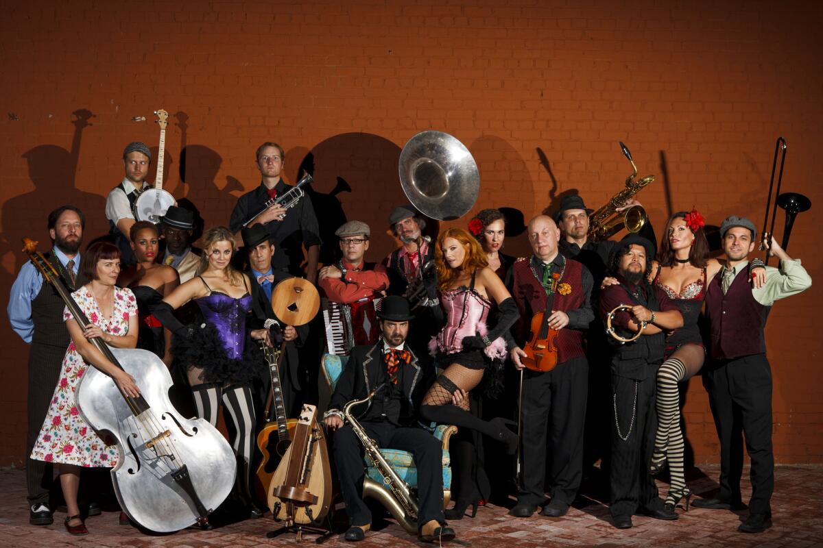 Band leader Vaud Overstreet (aka Andy Comeau), center, poses with his band Vaud & the Villains outside of Cafe Club Fais Do–Do on Sept. 15, 2012 in Los Angeles. (Patrick T. Fallon / For the Los Angeles Times)