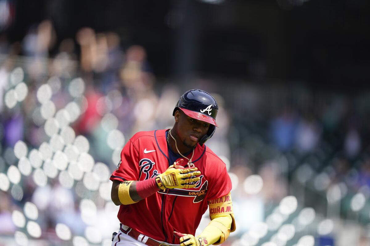 Braves OF Ronald Acuña Jr. departs with abdominal strain - The San Diego  Union-Tribune