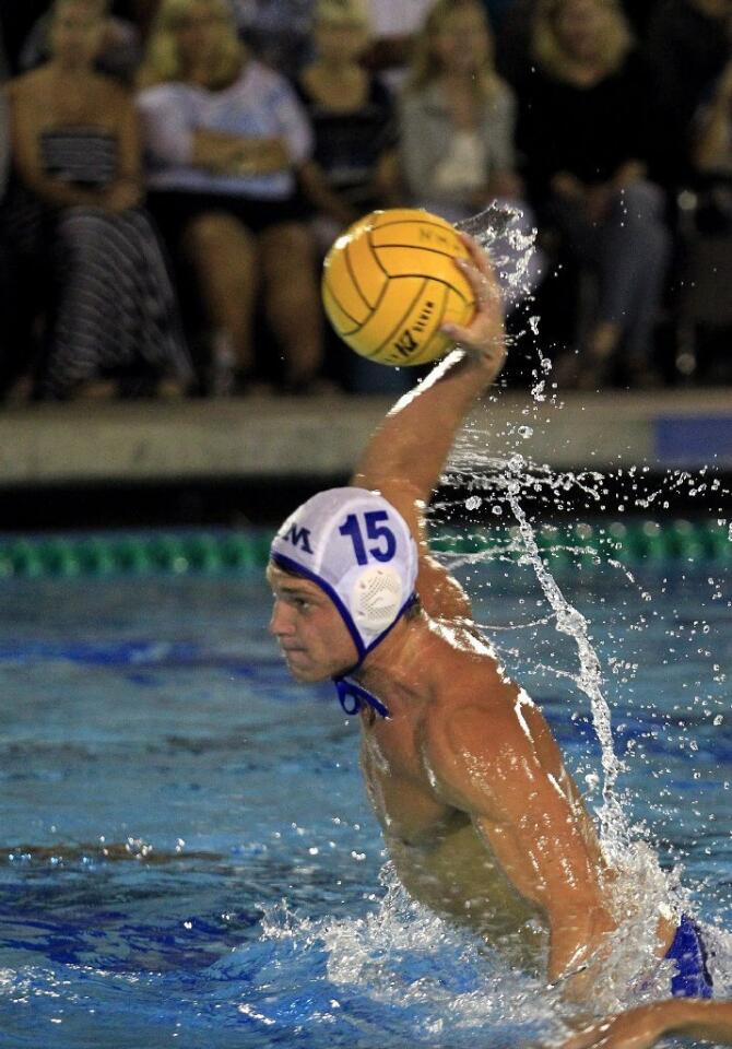 Corona del Mar High's Matt Sherburne scores on a penalty shot during the second half against Newport Harbor in the Battle of the Bay game on Saturday.