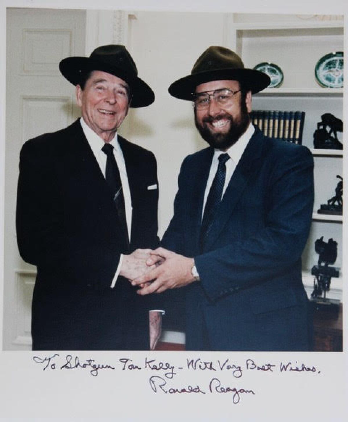 "Shotgun Tom" Kelly visits with President Ronald Reagan in the oval office in the late 1980s