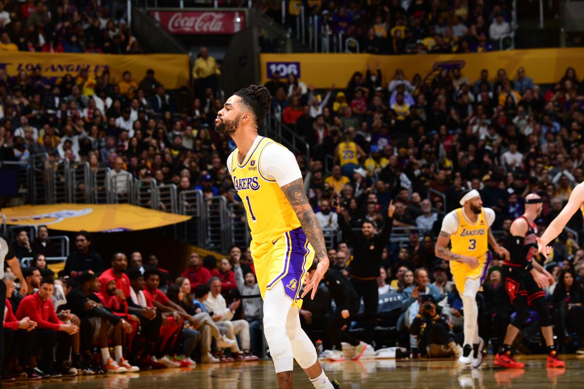 Lakers guard D'Angelo Russell celebrates after making a three-pointer against the Chicago Bulls at Crypto.com Arena.