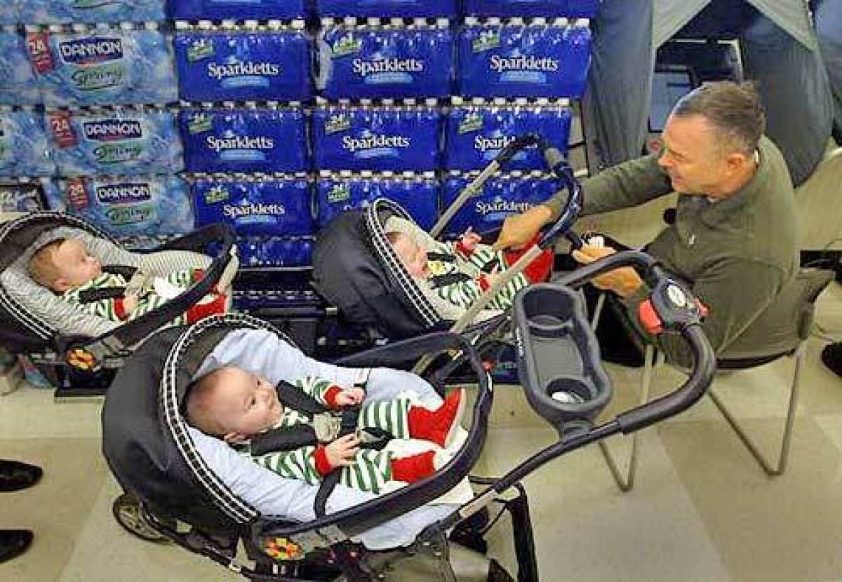 Dana Rohrabacher takes his triplets with him to vote in 2004. The Huntington Beach Republican is hoping that his tendency to go his own way wont keep him from getting the chairmanship of the House Science Committee.