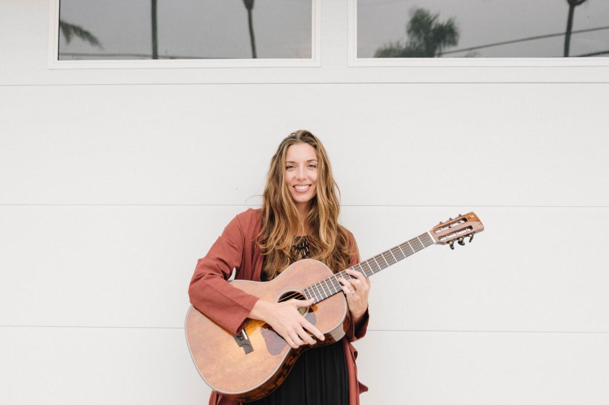 Rheanna Downey, a singer-songwriter based in San Diego, is one of the musicians performing at San Diego Festival of the Arts.