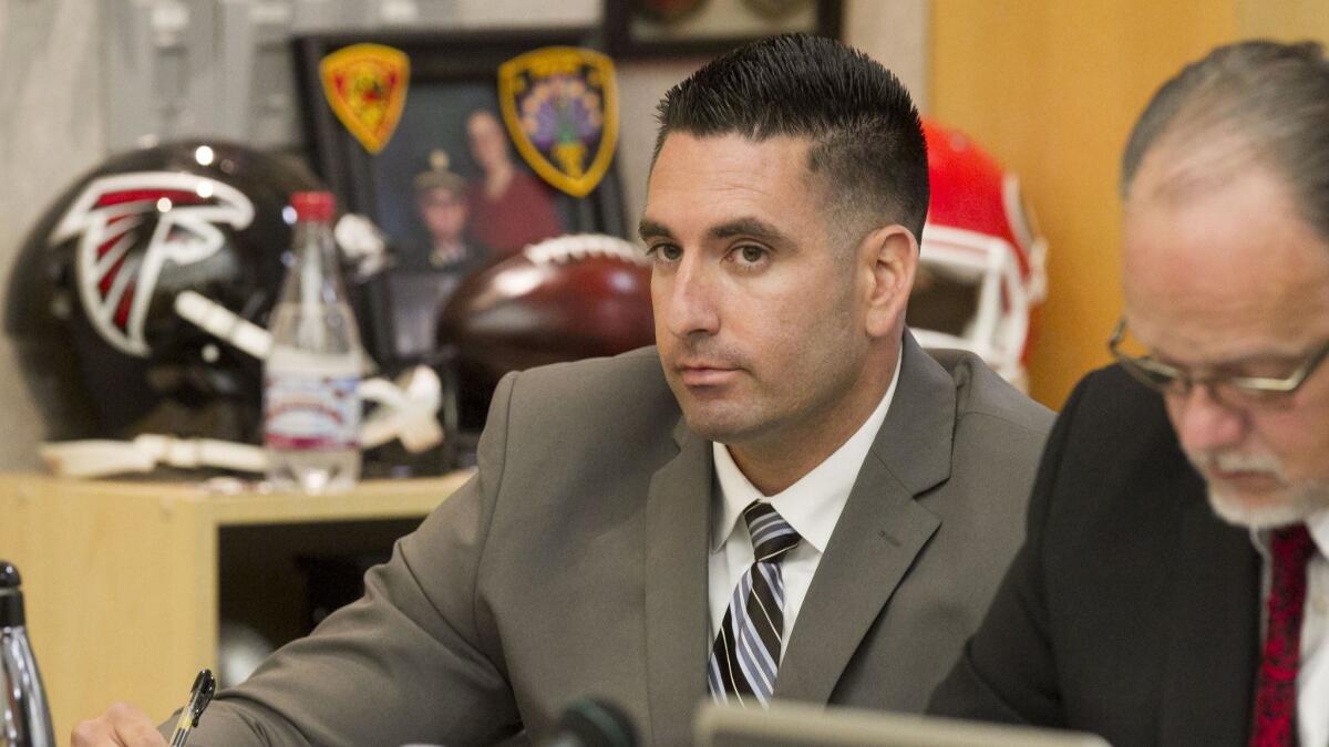 Deputy Richard Fischer, shown here in a Vista courtroom, was ordered to stand trial on 15 counts related to accusations of groping women under color of authority.