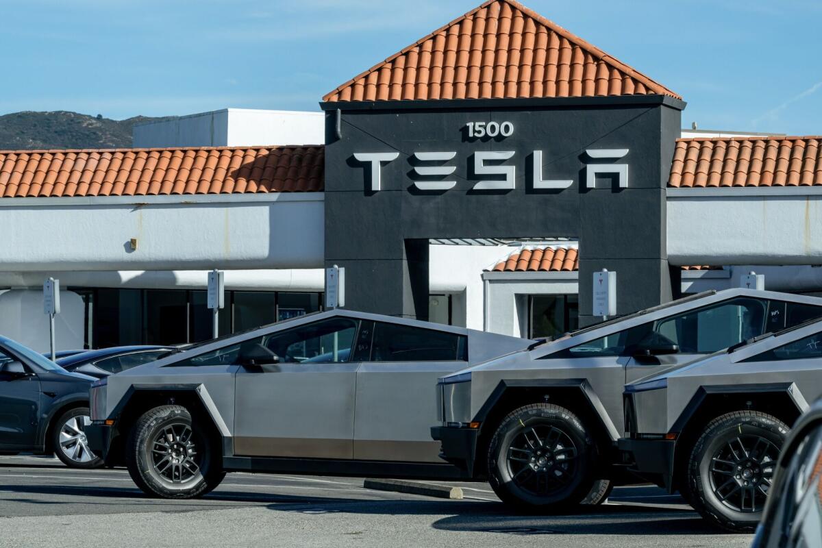 Tesla Cybertrucks in front of the company's store in Colma.