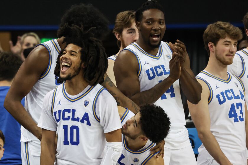 UCLA Bruins guard Tyger Campbell (10) celebrates a 75-59 win over the Arizona Wildcats at Pauley Pavilion.