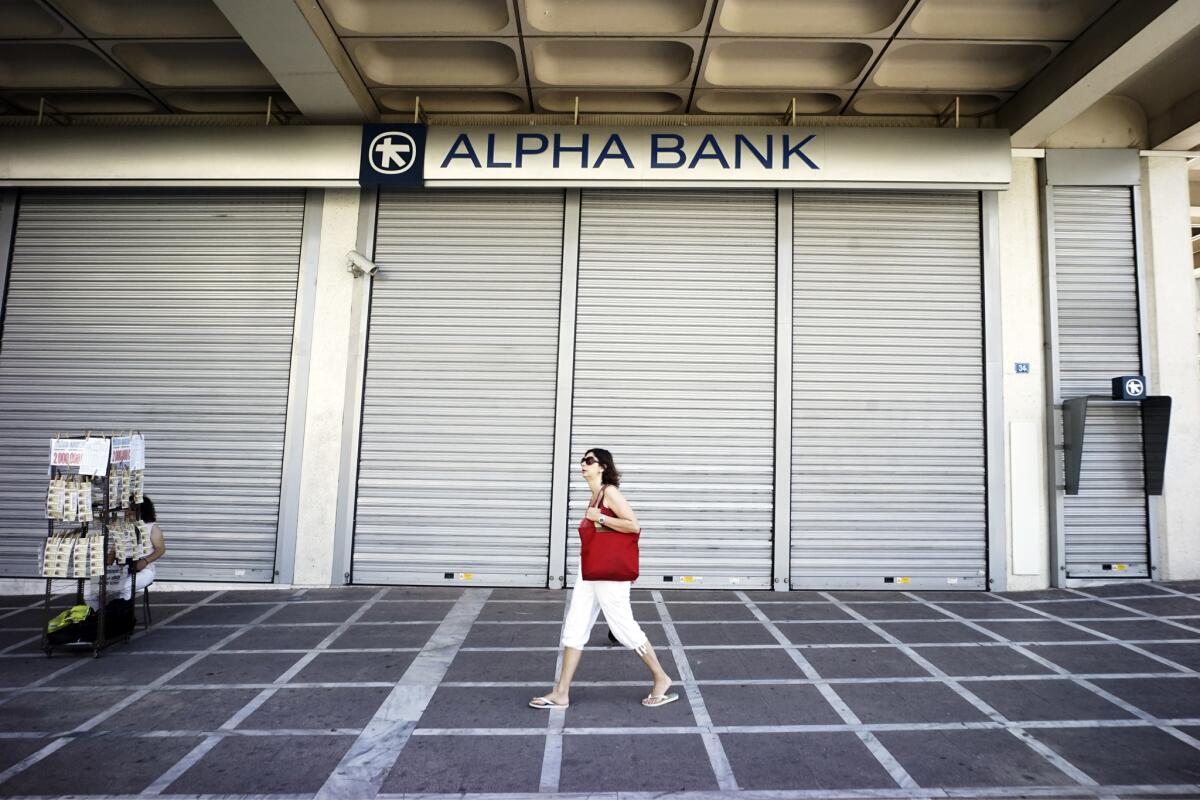 Banks were shuttered in Athens on Monday. To prevent another run on euro deposits, Greece ordered a weeklong bank closure, and residents were limited to about $66 in cash withdrawals from ATMs per day.