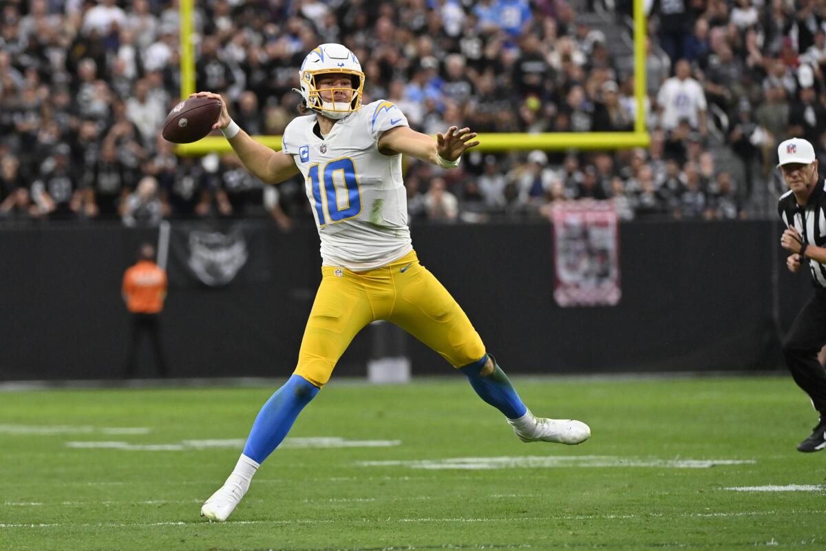 December 11, 2022 Los Angeles Chargers quarterback Justin Herbert  celebrates a first down run during the NFL football game against the Miami  Dolphins in Inglewood, California. Mandatory Photo Credit : Charles  Baus/CSM/Sipa