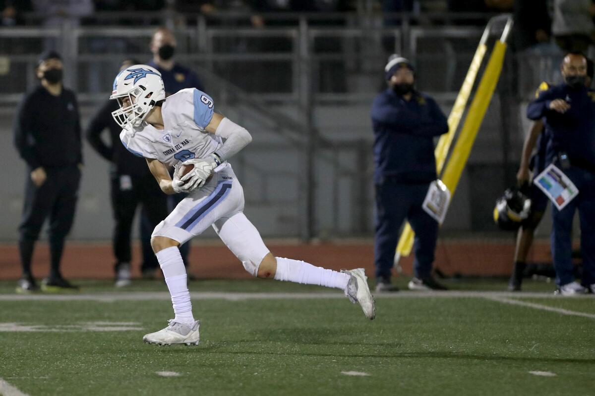 Corona del Mar's Cooper Hoch finds himself all alone behind the defense and runs for a 64-yard TD.
