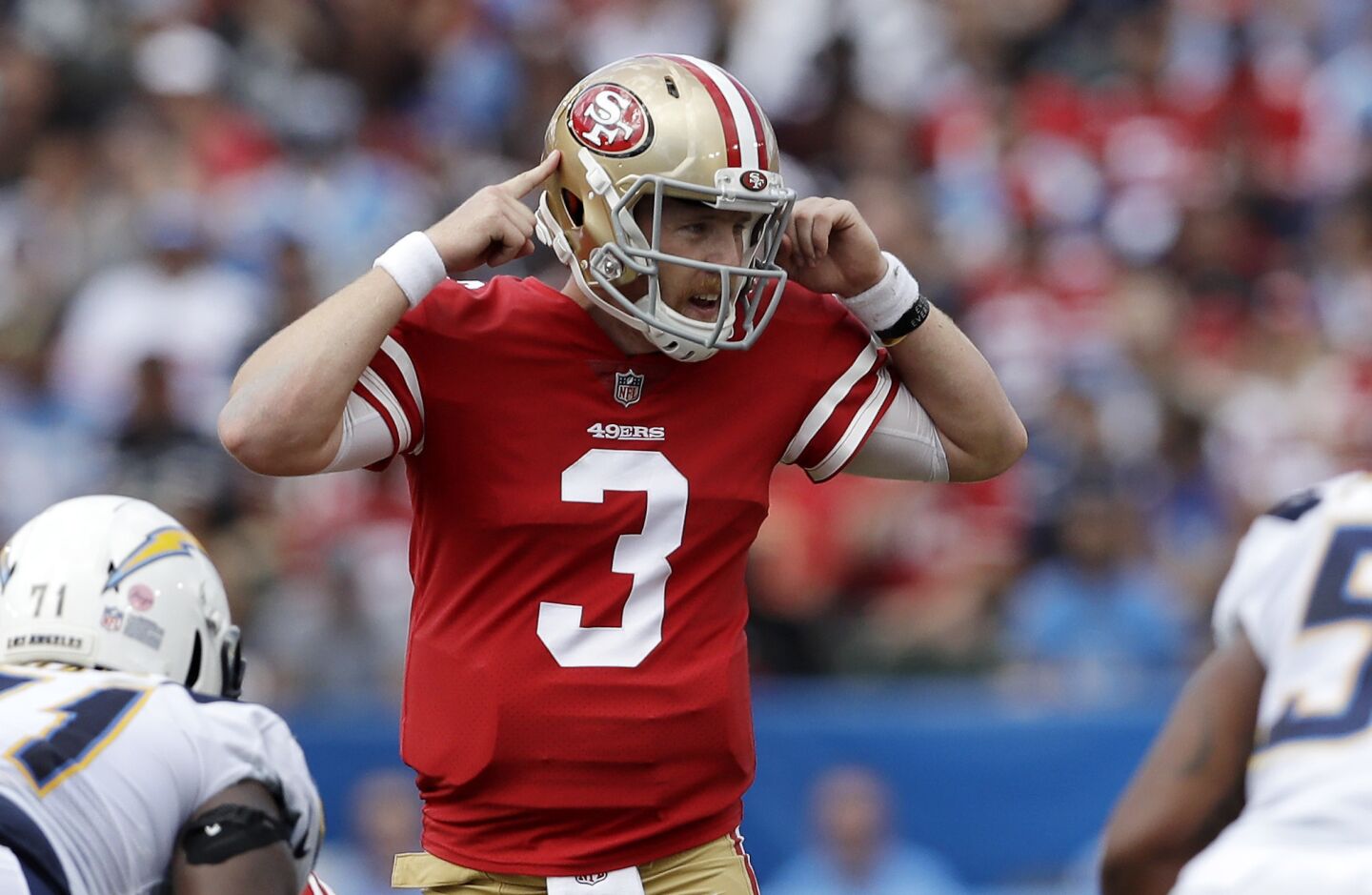 San Francisco 49ers quarterback C.J. Beathard gestures during the first half of an NFL football game against the Los Angeles Chargers, Sunday, Sept. 30, 2018, in Carson, Calif.