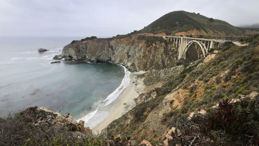 Big Sur Locals Are Fed Up With Tourists Banner Over Bixby Bridge Shows Los Angeles Times