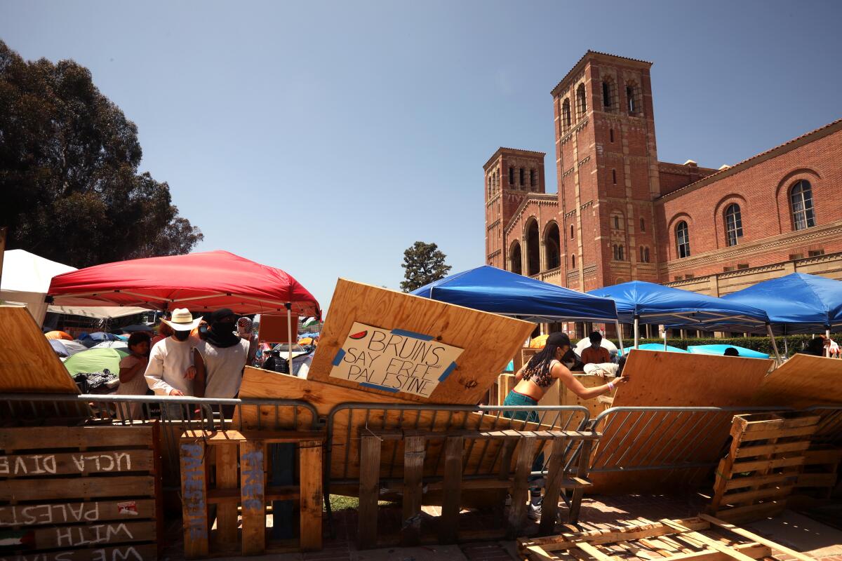 Protesters near a barricade at UCLA