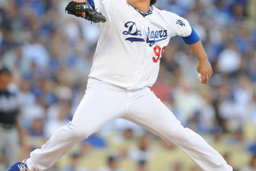 Dodgers starter Hyun-Jin Ryu delivers a pitch during the first inning against the Atlanta Braves in Game 3 of the National League division series.