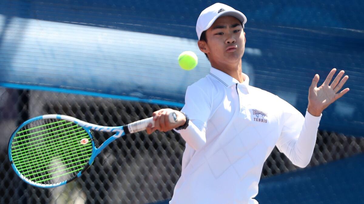 Freshman Ben Nguyen, shown hitting a forehand on May 16, was a key player for the Fountain Valley High boys' tennis team and highlighted the Barons' depth.