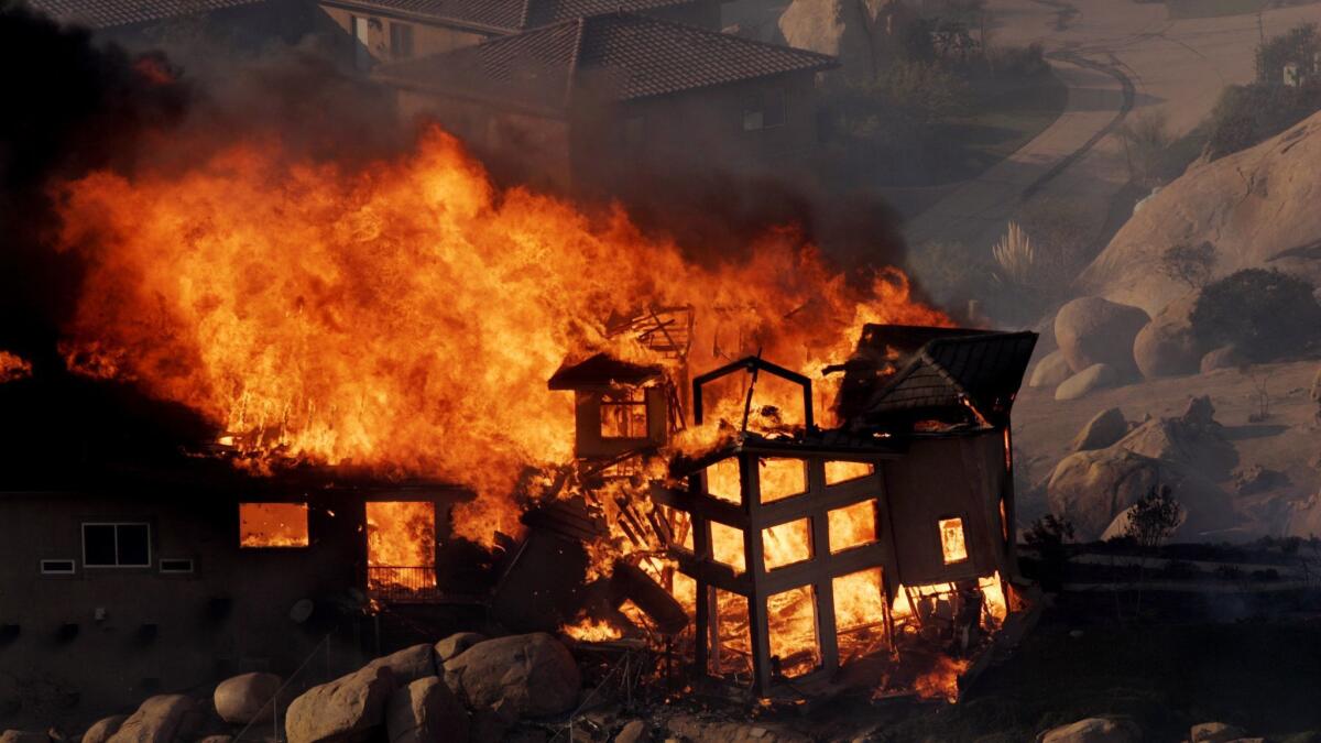 A fully engulfed home south of Highland Valley Road, East of Lake Ramona during the 2007 Harris Fire, one of the most destructive blazes in California History.