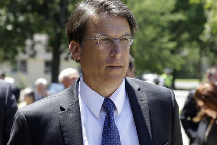North Carolina Gov. Pat McCrory signed a strict new voter ID bill into law on Monday.