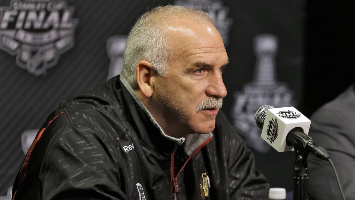 Chicago Blackhawks Coach Joel Quenneville speaks during a news conference in Tampa, Fla., on Tuesday.