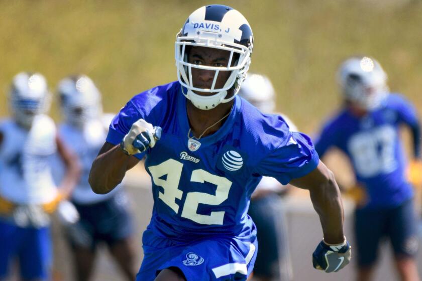 Los Angeles Rams running back Justin Davis (42) runs a drill during the NFL football rookie minicamp at the team's practice facility in Thousand Oaks, Calif., Friday, May 12, 2017. (AP Photo/Michael Owen Baker)