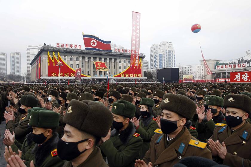 In a mass rally the Pyongyang city army-people celebrate the election of Kim Jong Un as General Secretary of the WPK (Workers' Party of Korea), overlooked by inspirational national symbols at Kim Il Sung Square in Pyongyang, North Korea, Friday Jan. 15, 2021. (AP Photo/Jon Chol Jin)