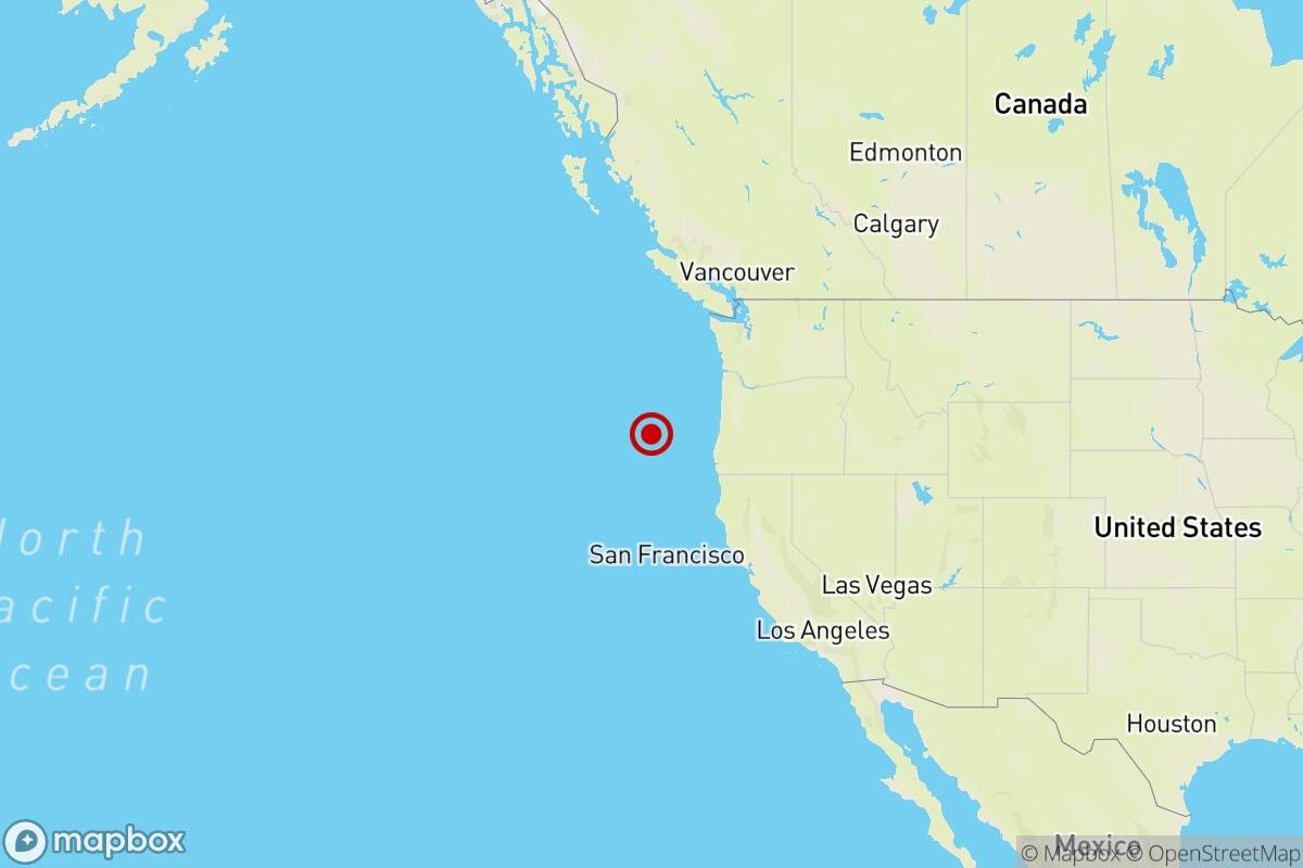 A map shows the U.S. and the location of an earthquake in the ocean near Oregon.